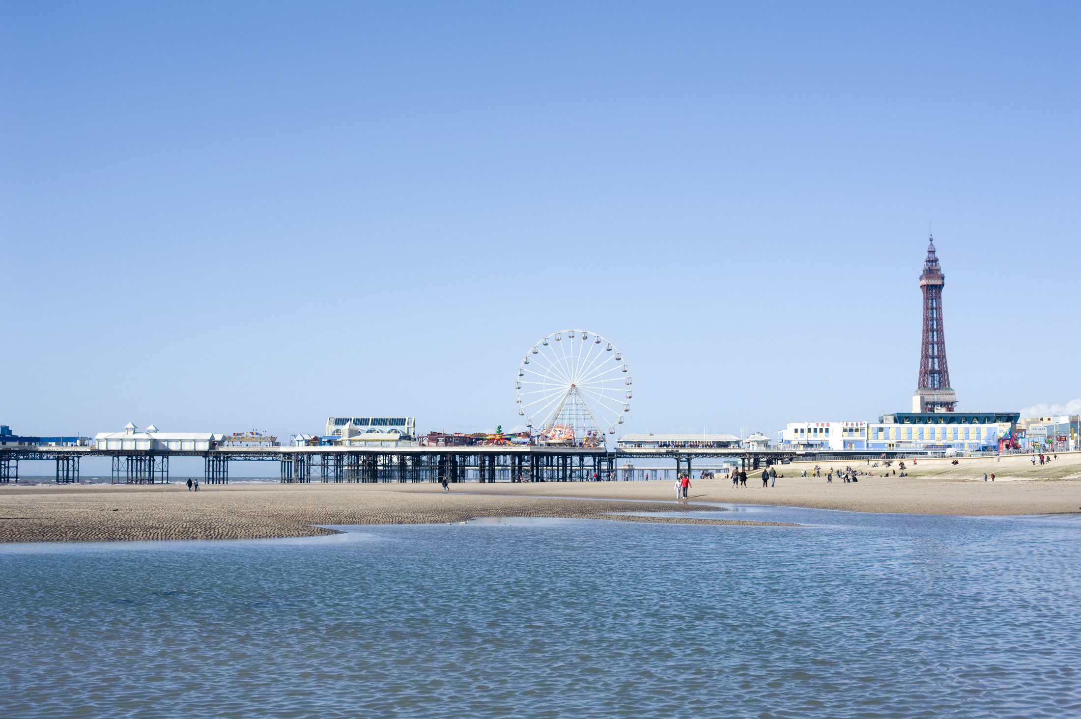 an image of blackpools central pier with ferris wheel