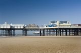 a view of blackpools central pier, the north pier can be seen in the distance