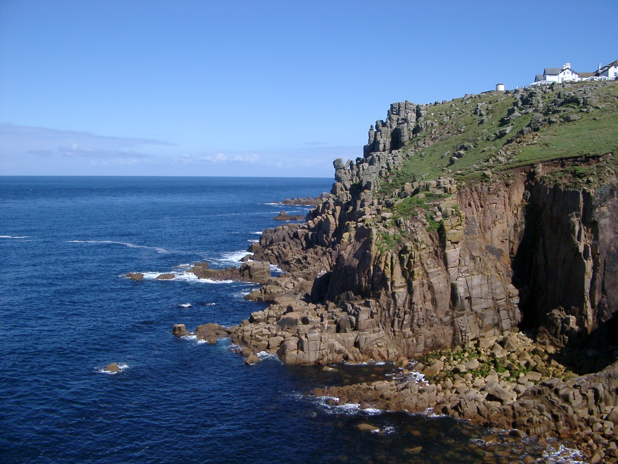 an image of coastal cliffs and lands end, cornwall, uk