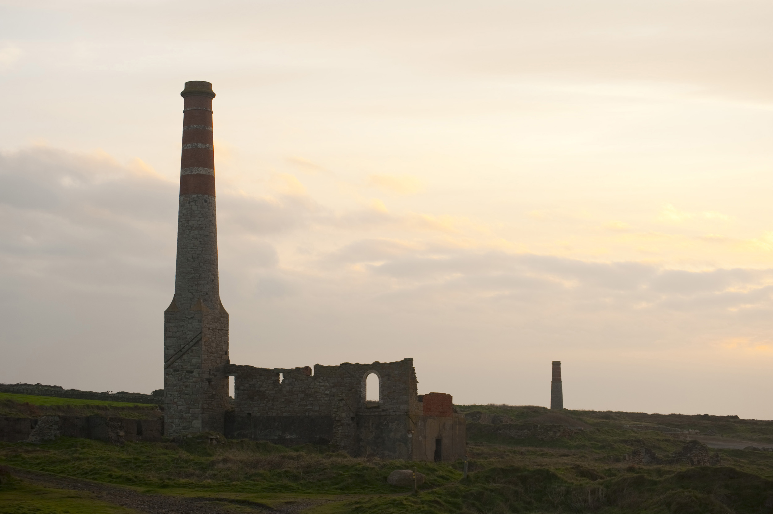 an image of Remains of buildings and a chimney at the levant mine, botallack, Cornwall