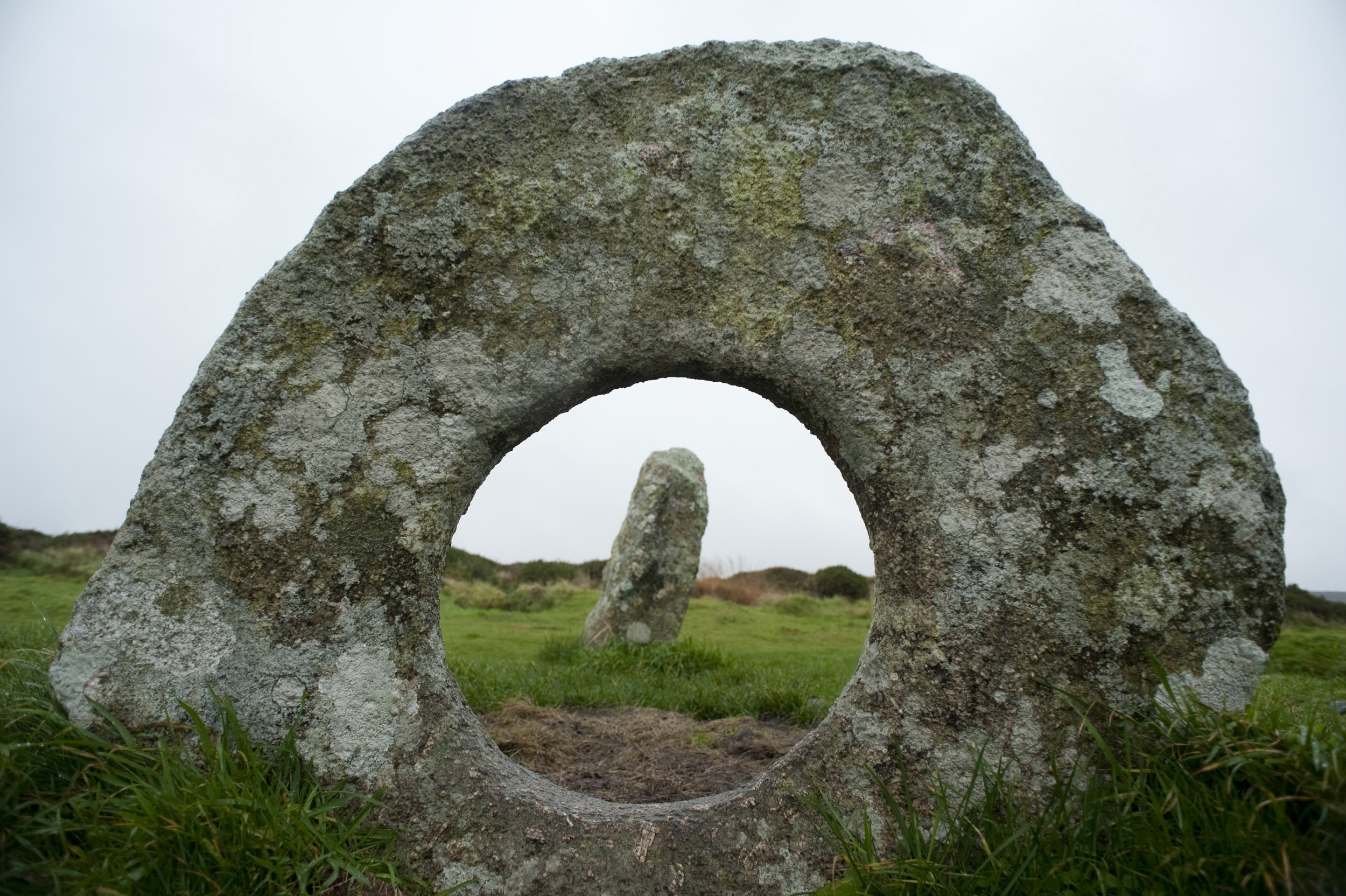 an image of Men-an-Tol, in the Cornish Language literally meaning the hole stone
