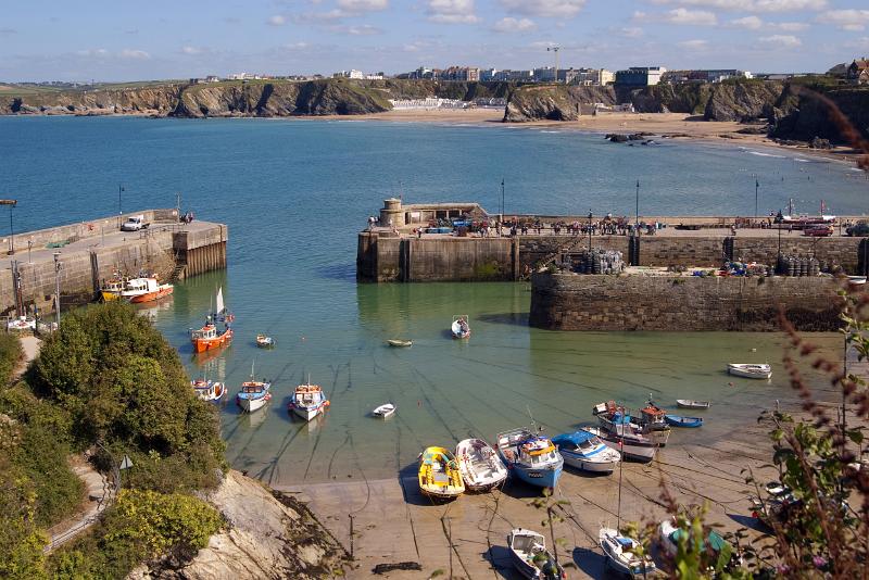 looking down on newquay harbour and coastal cliffs behind
