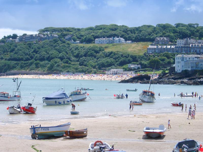 a sunny day at the harbour in st ives, cornwall
