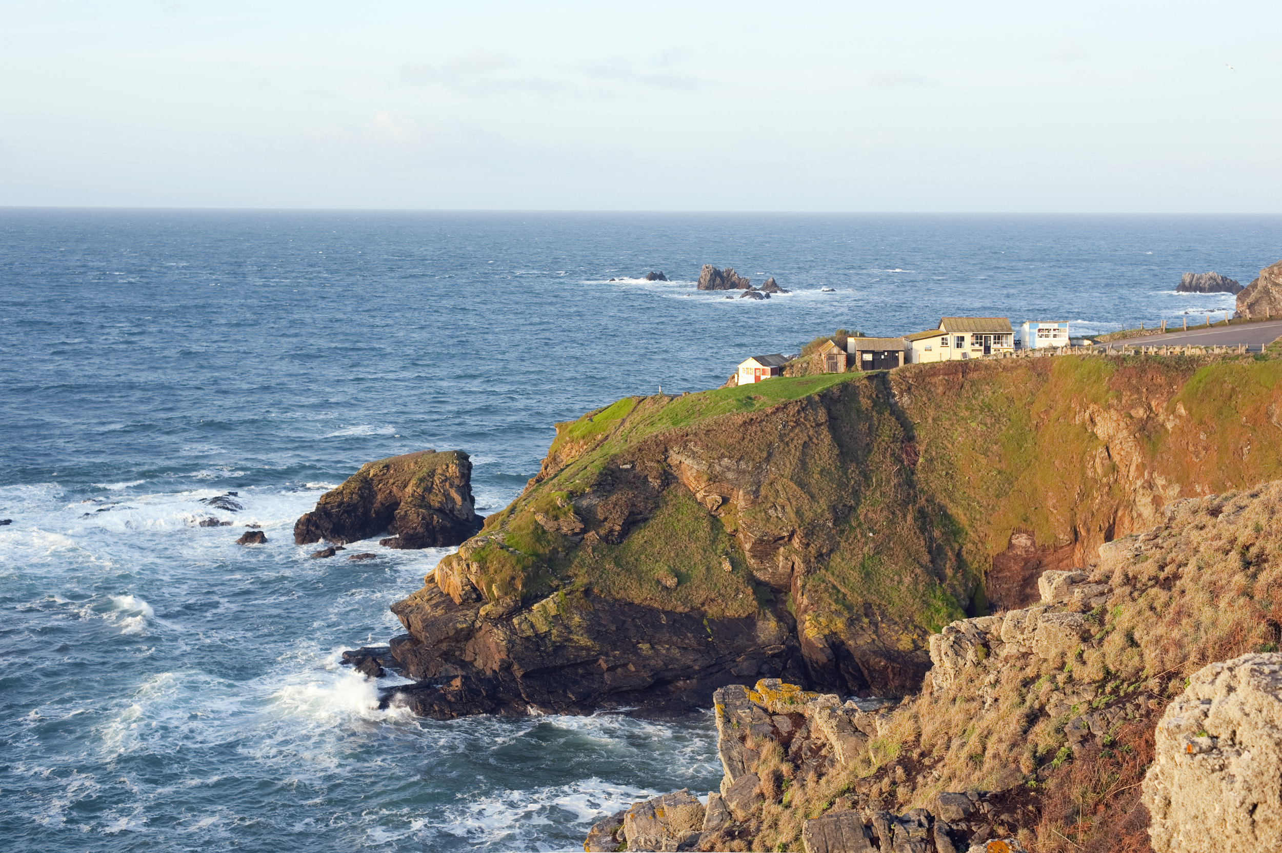 an image of tourists shops on mninland englands most southerly spot, lizard point