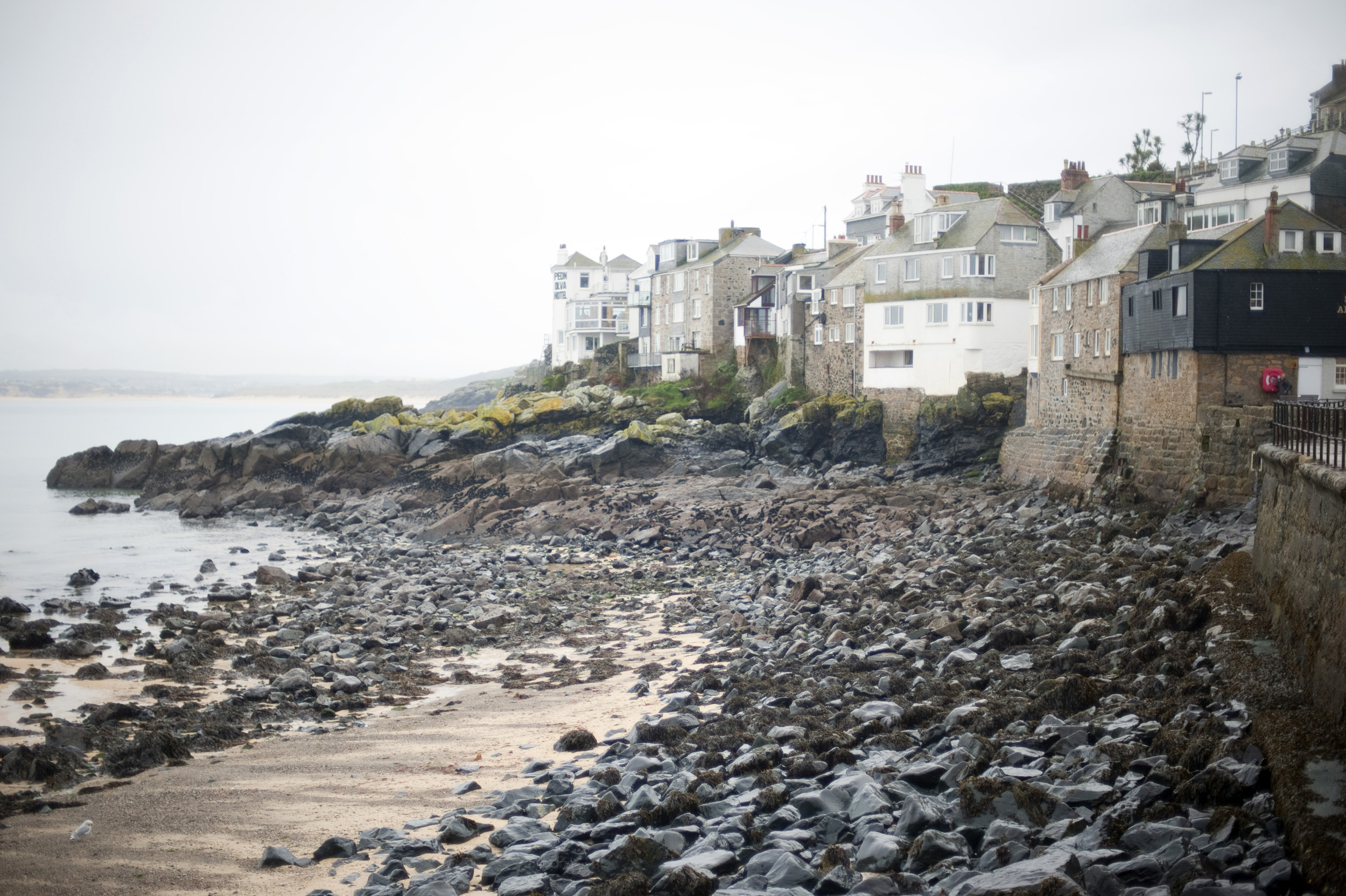 an image of rocky foreshore at saint ives, a popular seaside holiday town in cornwall