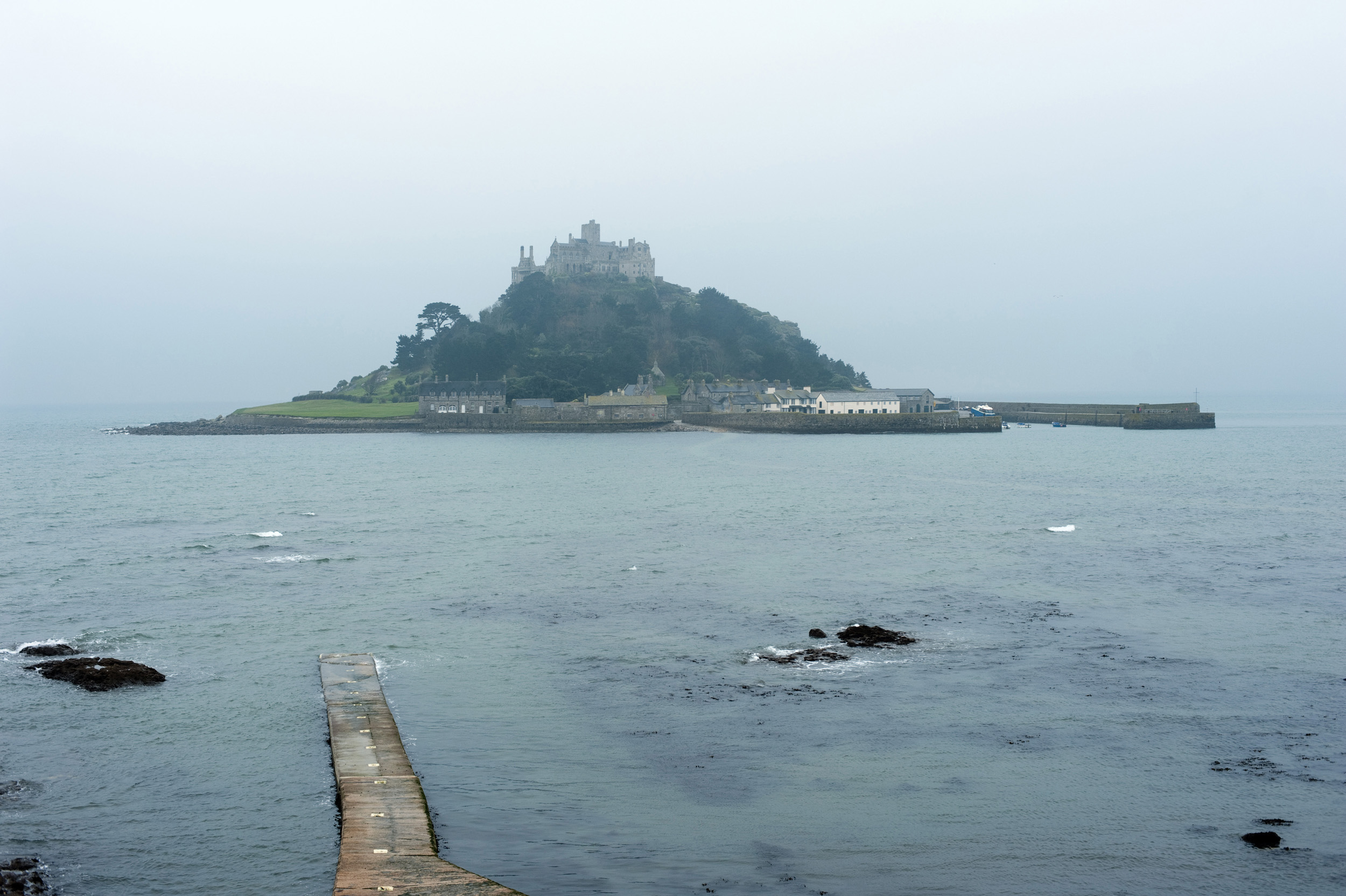 an image of a rain day looking from marazion, towards st michaels mount