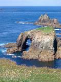 Enys Dodnan arock arch at landsend cornwall