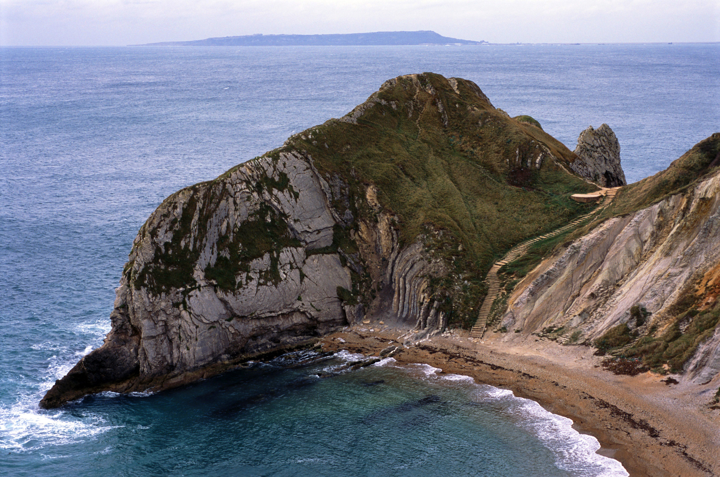 an image of lulworth cove and the jurassic coastline,dorset