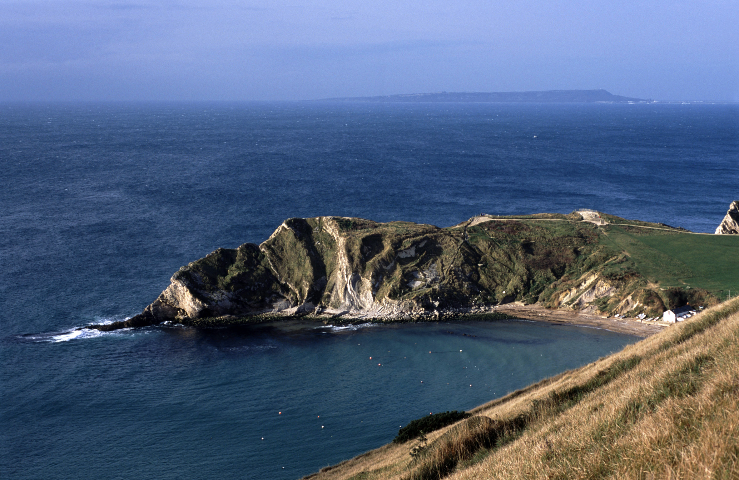 an image of lulworth cove on the jurassic coast, dorset