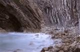 folded limestone rock formations on the jurassic coast, stair hole, lulworth, dorset