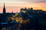 Floodlit at night, edinburgh castle, the camera obscura (pink) and other landmarks in the so called Athens of the north