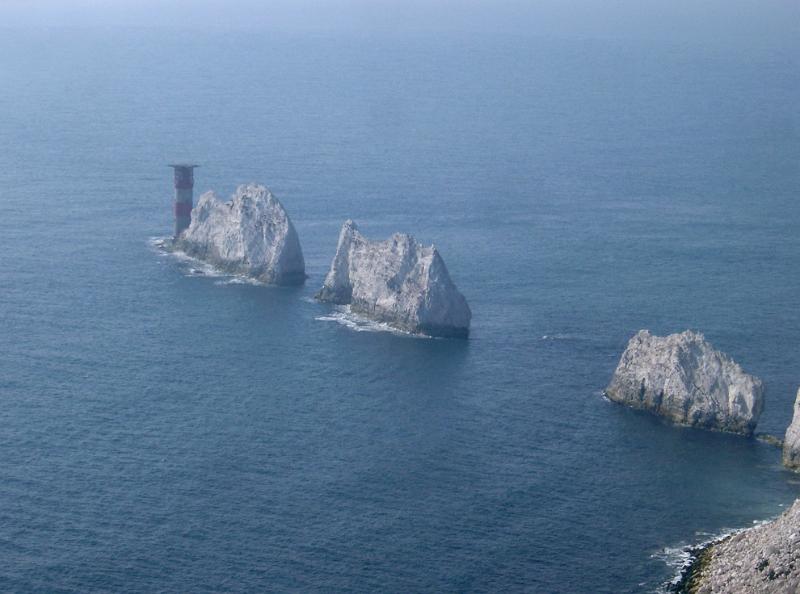 Famous Needles Chalk Rock Formations that rise out of the sea off the western extremity of the Isle of Wight, UK, Close to Alum Bay.