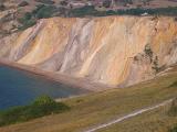 Colorful chalk cliffs eroded by the weather and action of the tides at Alum Bay, Isle of Wight , view from the clifftop