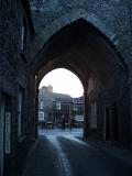 stone arch gatehouse in cartmel village