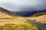 stormy clounds on the road along the hardknott pass driving towards cockley beck and wrynose pass