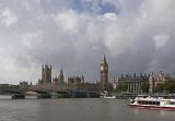 a view of the palace of westminster and big ben clock tower from across the river and westminster bridge