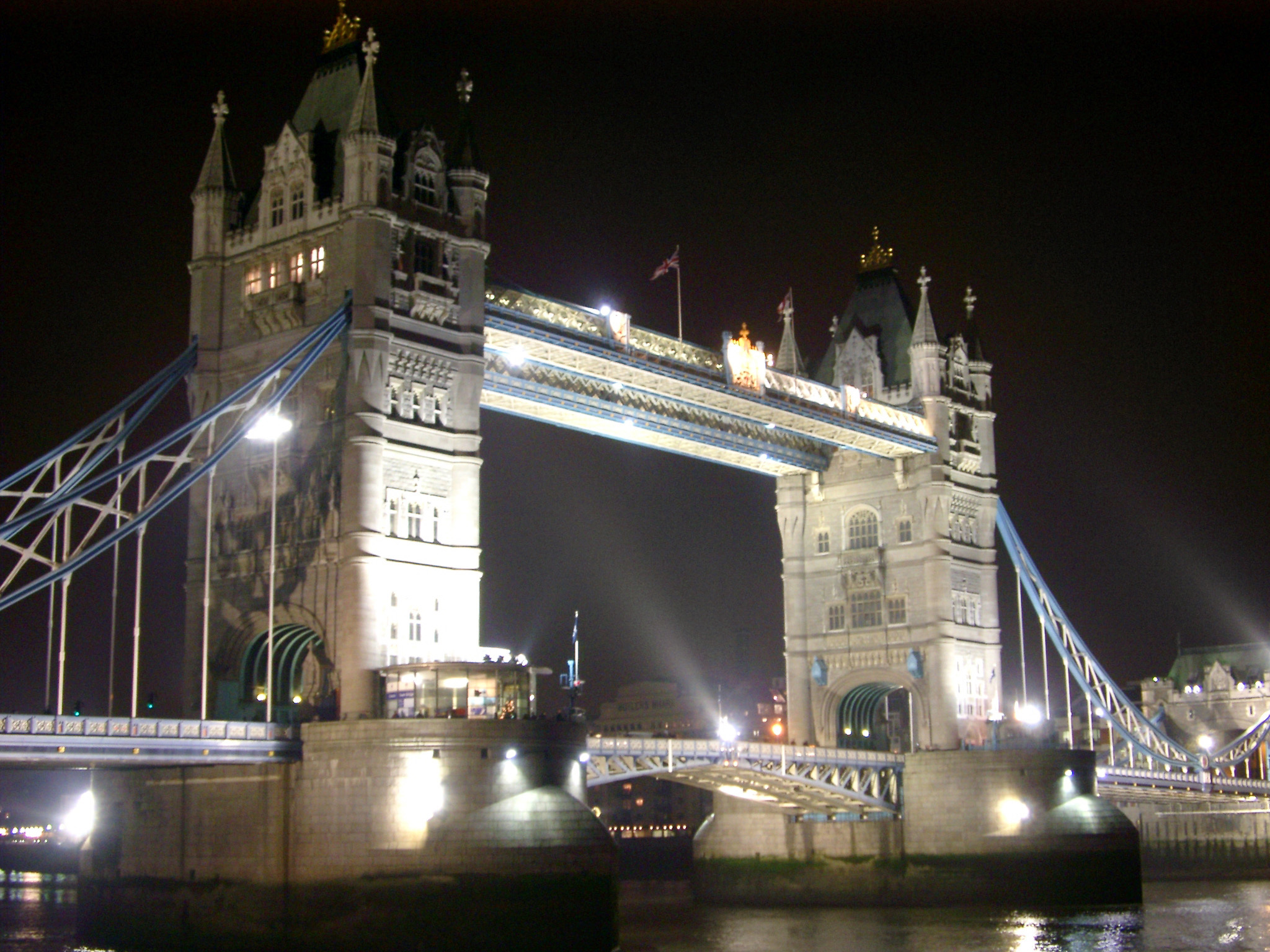 an image of Tower Bridge in London Passing River Thames. Captured at Night Time