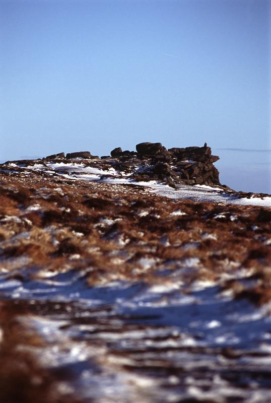 Landscape of Famous Kinder Scout in England on Light Blue Sky Background on One Sunny Day.