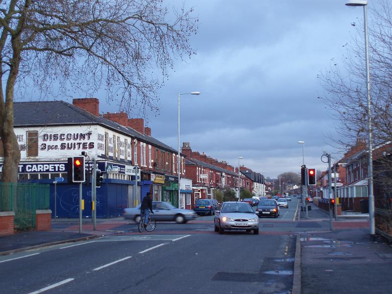 a street view in moss side, inner city manchester