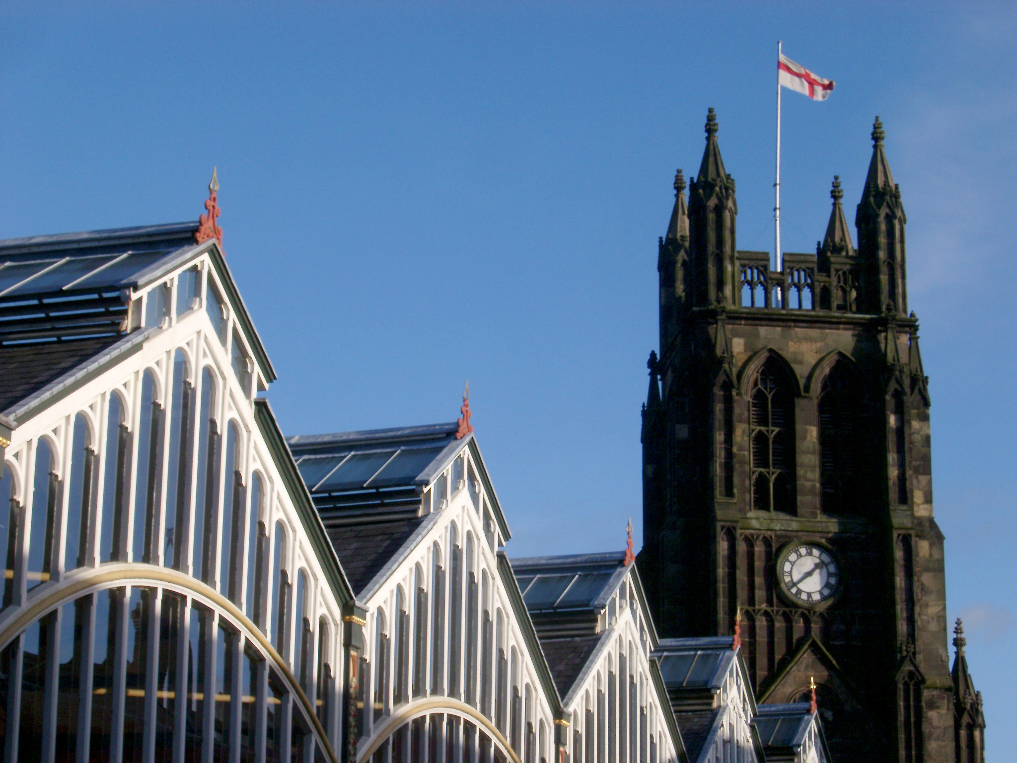 an image of stockport market buildings and clock tower