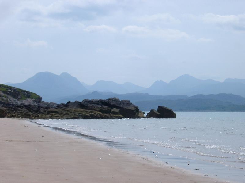 Sandy beach on the shores of Loch Gairloch in the North-West highlands of Scotland on a misty day