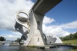 Low angle view of rotating boat lift in Scotland connecting two canals on a sunny day