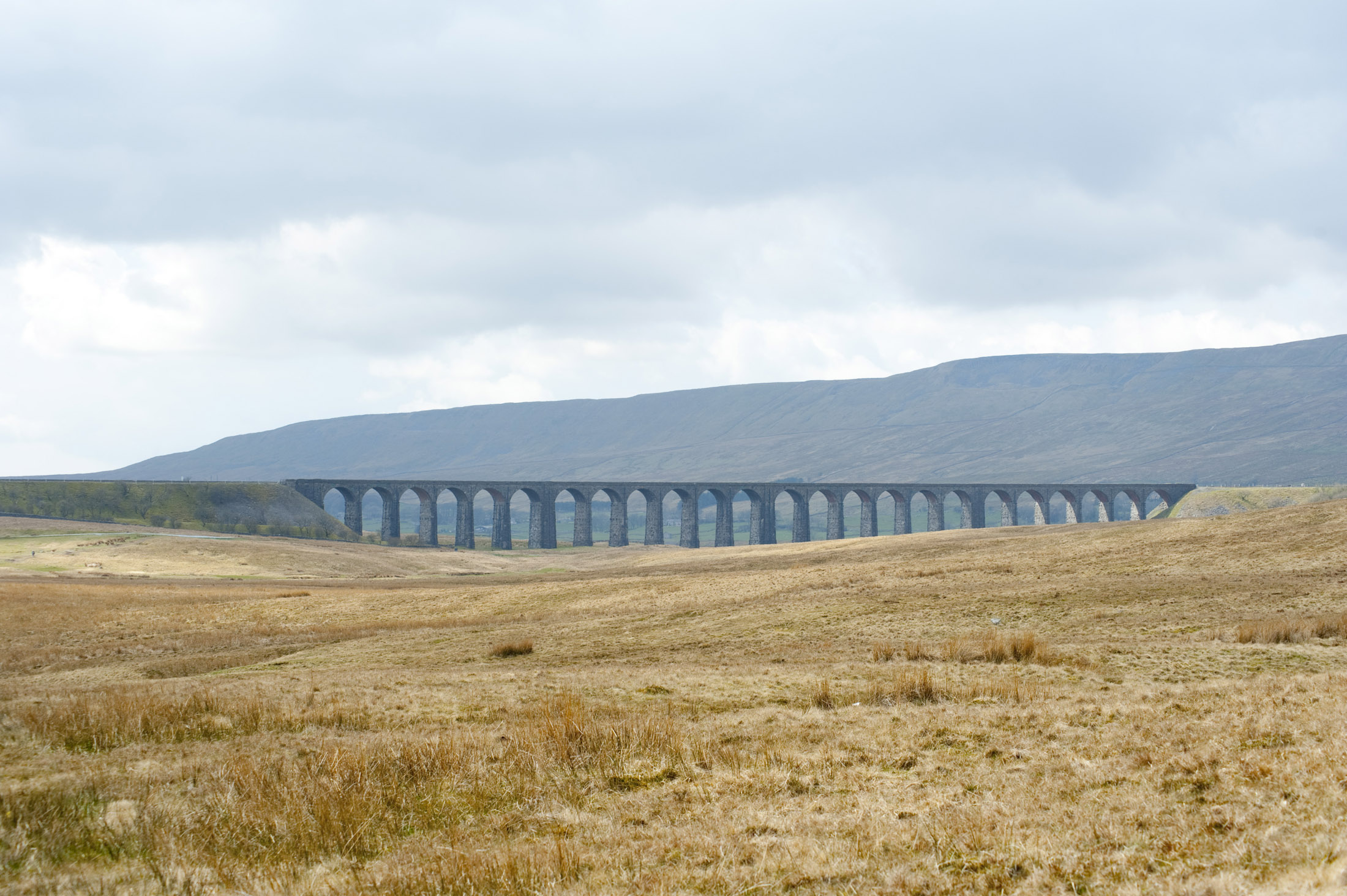 an image of a distant view of the ribble head viaduct, yorkshire, england