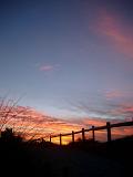 Beautiful Sunset View at West Australia with Silhouette Field and Orange and Light Blue Sky Scene.
