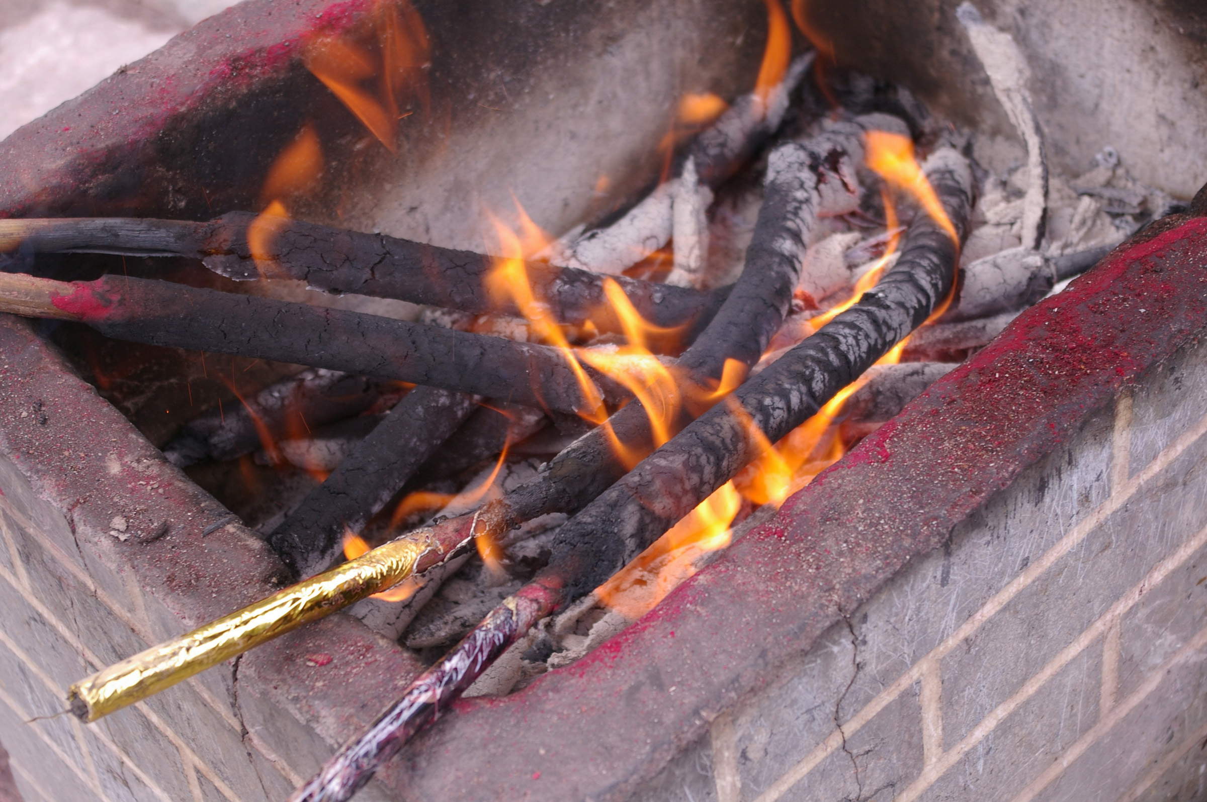 an image of Close up Burning Chinese Incense Sticks, Traditional Lifestyle of Chinese People.