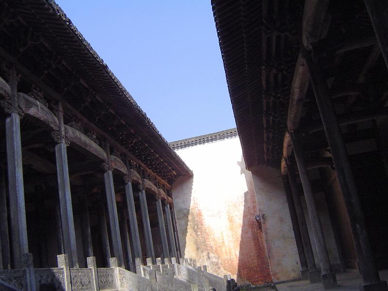 Old Vintage Architectural Chinese Temple Structure Detailed Design on Lighter Blue Sky Background.