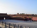 Random Tourists at Famous Forbidden City Temple, the Imperial Palace, Located in China. Captured on Lighter Blue Sky Background.
