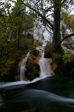 Beautiful Natural Waterfalls Attraction, Rocks with Green Plants and Trees in China