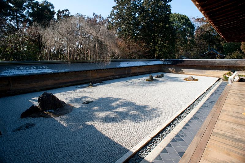 a karesansui (dry landscape) rock garden at RyoÂan-ji temple, Kyoto, Japan
