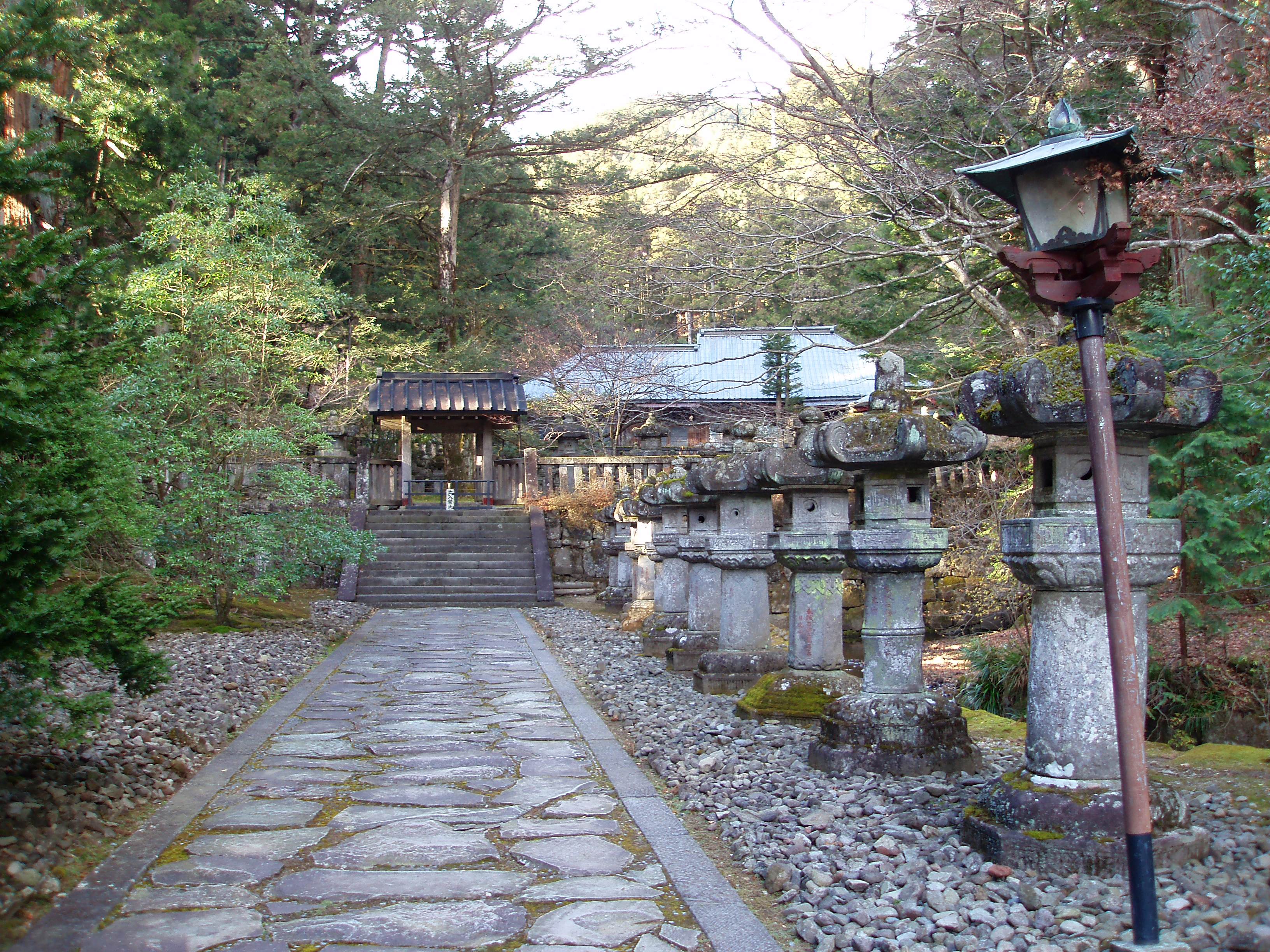 an image of stone path to one of the many temples at nikko