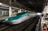 Hayabusa (Peregrine Falcon) or E5 shinkansen train at a rail station in Japan