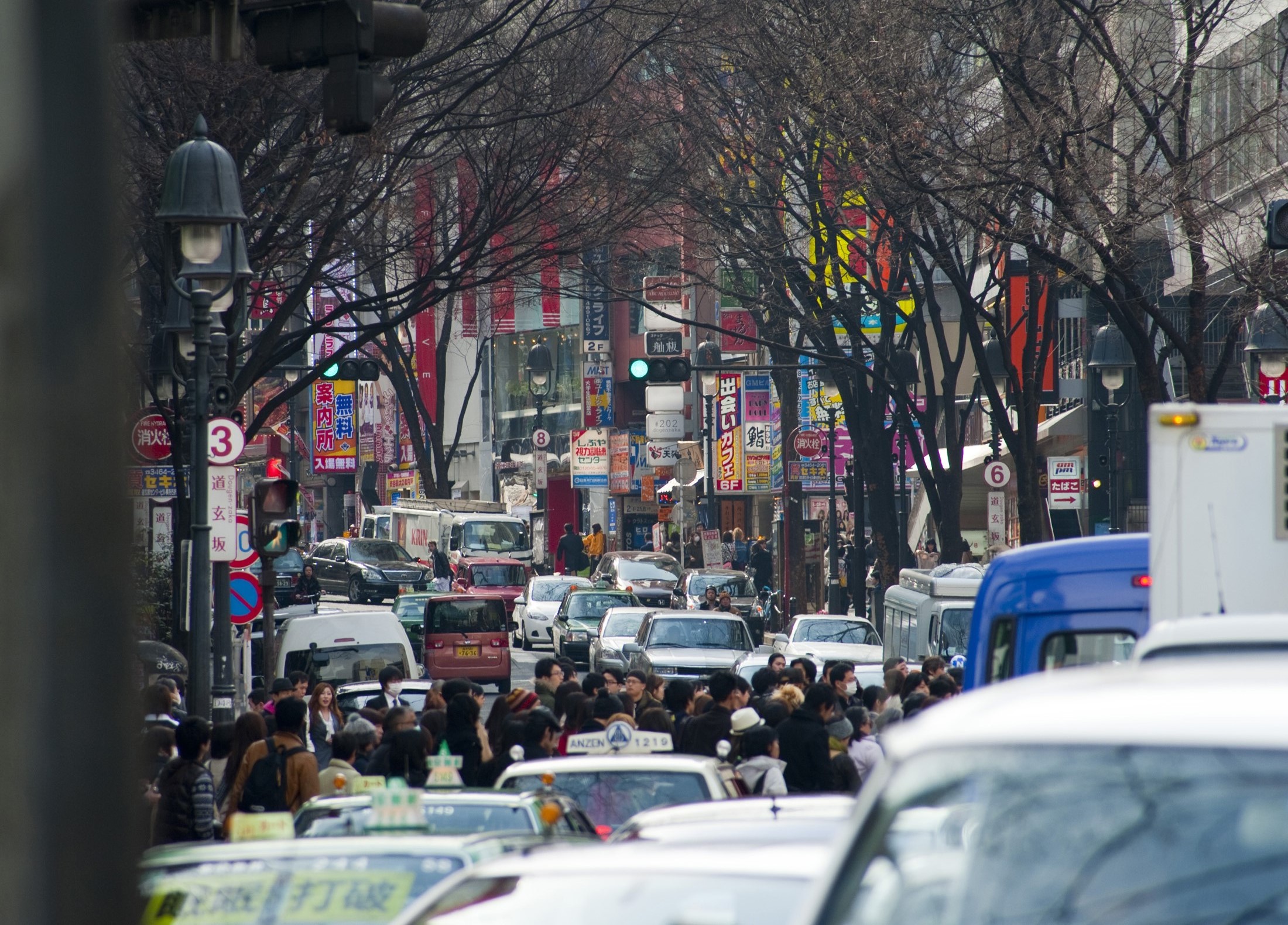 an image of colorful crowded streets of shibuya, tokyo, japan