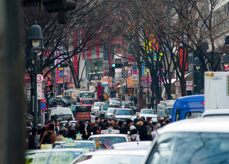 colorful crowded streets of shibuya, tokyo, japan