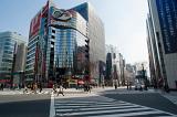 pedestrians crossing the street in the ginza district of tokyo - not model released