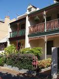 Exterior Design of Australian House Building with Terrace and Mini Garden in Front Located in Melbourne