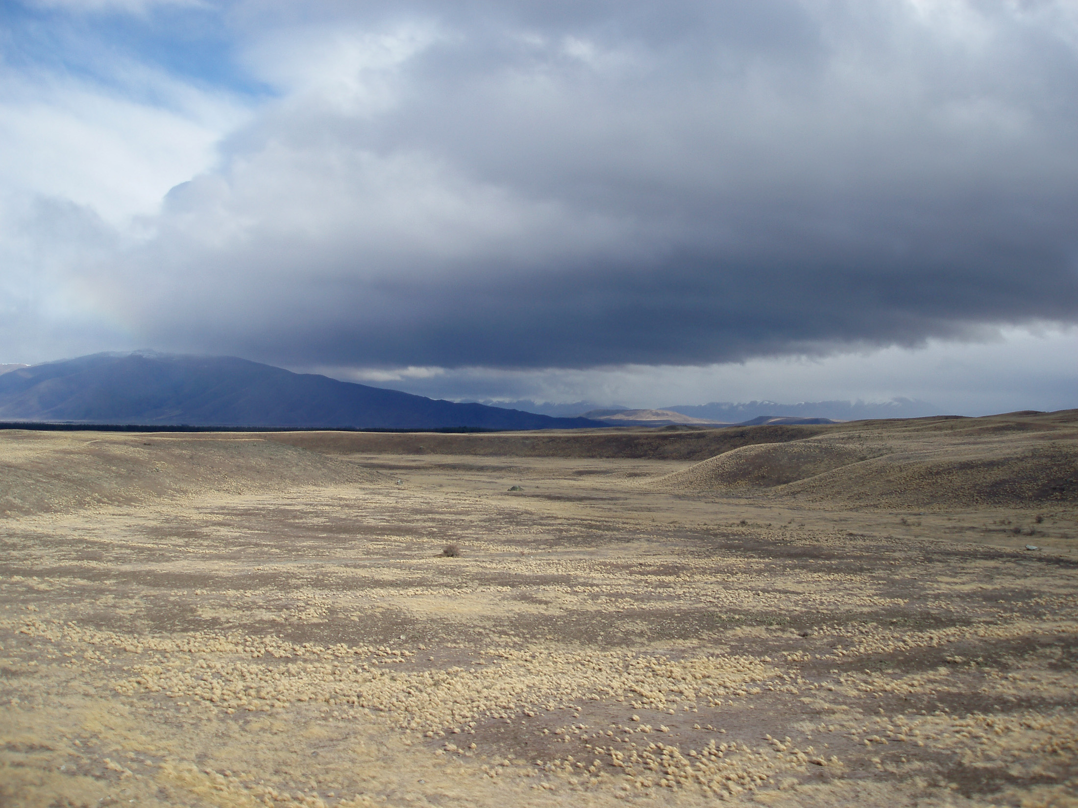 an image of stormy plains on newzelands south island near lake wanaka