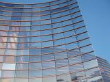 reflective glass font of the christchurch art gallery at sunset,