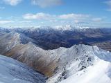 snow covered mountains viewed from coronet peak