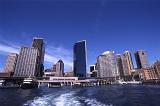 Looking off Back of Boat at Office Towers in Central Business District on Circular Quay, Bennelong Point, Sydney, Australia