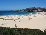 Tourists During Holiday at Famous Coogee Beach with Turquoise Sea Water Located in Australia. Captured in Panorama View.