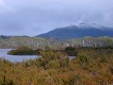View of Lake and Snow Capped Mountain with Rain Clouds, Tasmania, Australia