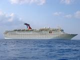 Large cruise ship or passenger liner at sea on a calm blue ocean conceptual of a summer vacation and travel