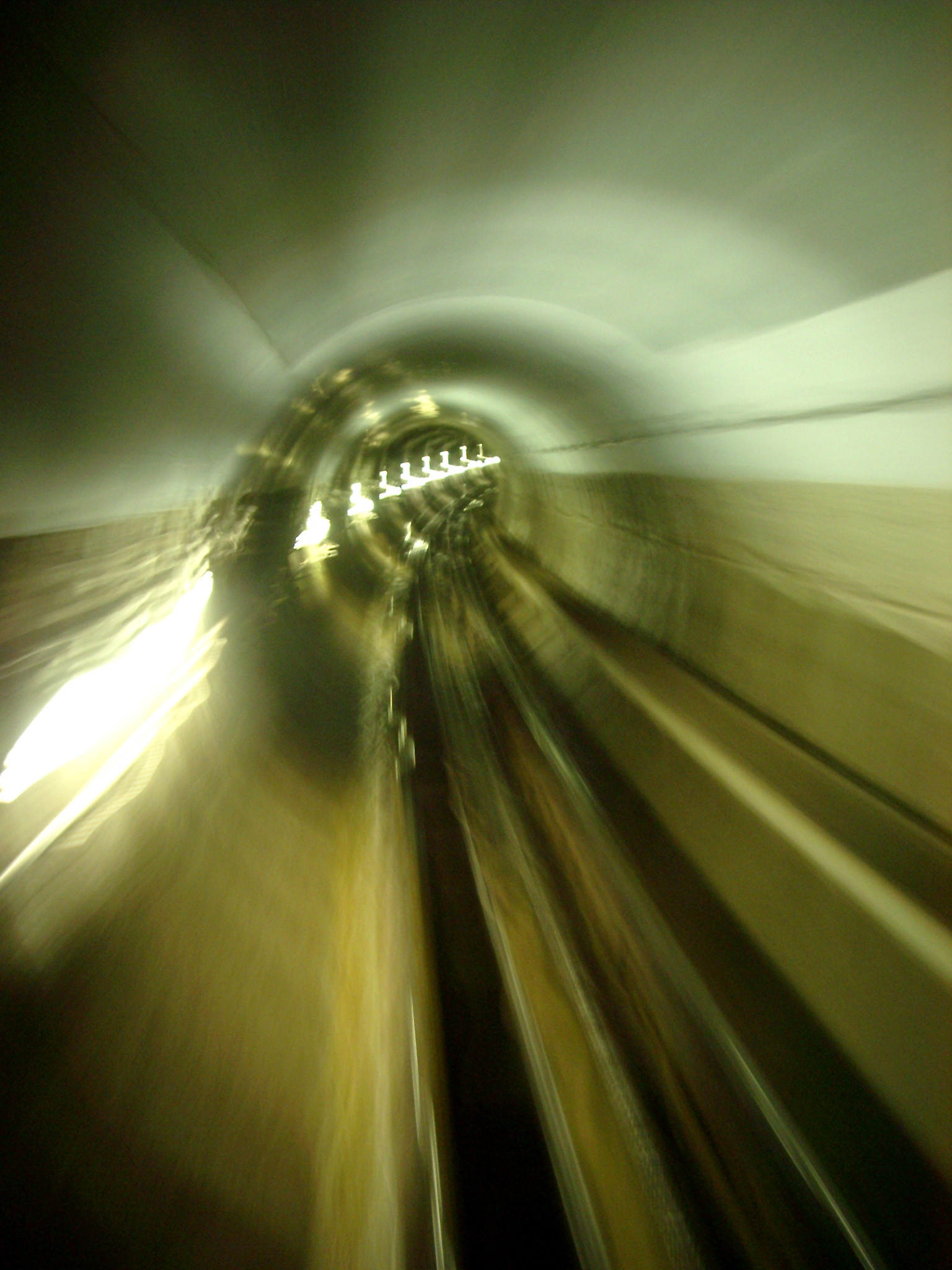 an image of Blurred Shot of Traveling Fast Through Rail Tunnel