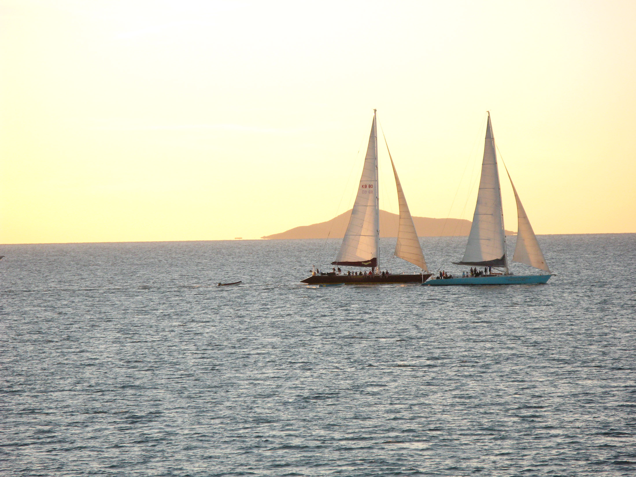 an image of sailing through the tropics on maxi sailing yachts