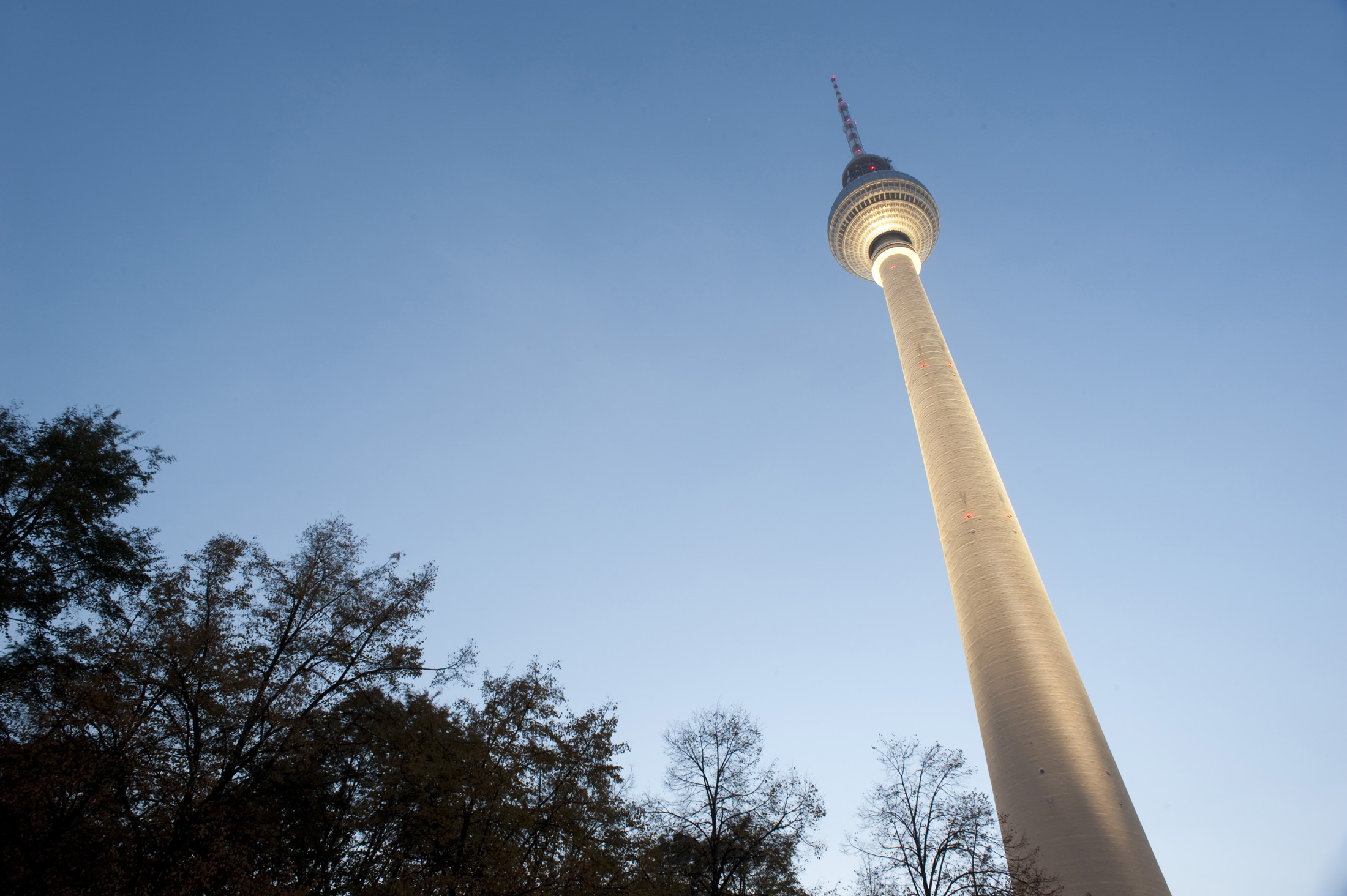 an image of the berlin tv tower, low angle view at twilight