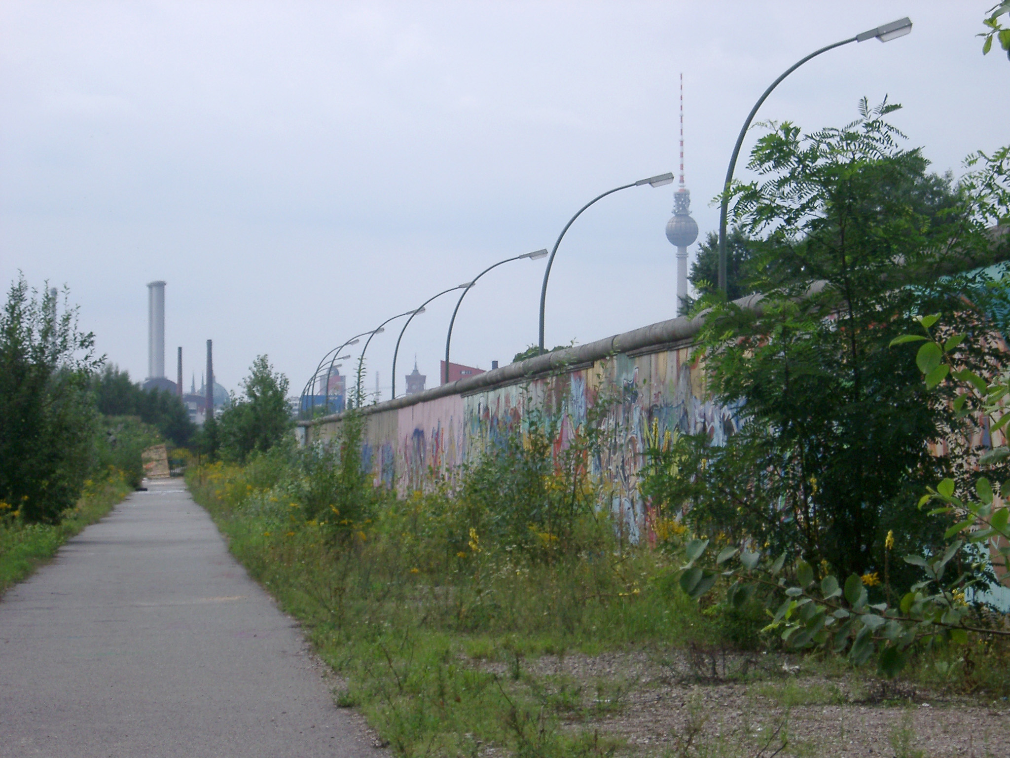 an image of View along a remaining section of the historical Berlin Wall erected by the German Democratic Republic to separate East and West Berlin